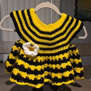 Handcrafted Yellow & Black Striped Baby Dress with Flower Accent